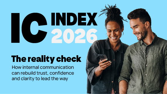 IC Index 2026: The reality check. Two colleagues smiling at a phone.