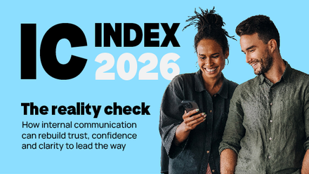 IC Index 2026: The reality check. Two colleagues smiling at a phone.